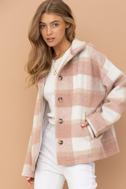 Expertly crafted with brushed yarn-dyed plaid material, this jacket from Blue B offers both style and functionality. The mock neck and button-up design add a touch of sophistication, while the side pockets provide convenience. The lovely rose color elevates any outfit.