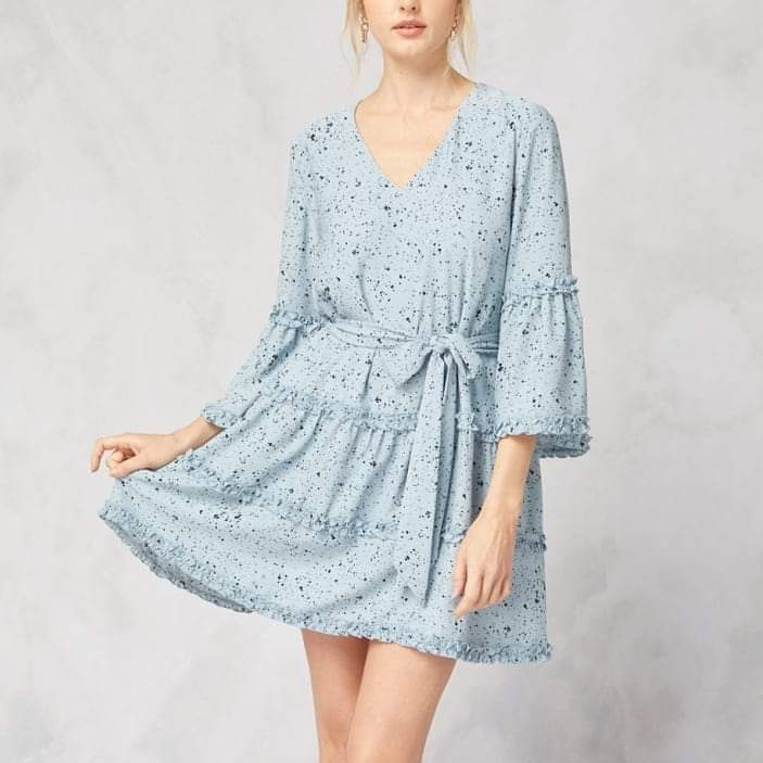 Elevate your style with our Frida Spotted V-neck Mini Dress. Featuring 3/4 sleeves with ruffle detail and a self-tie closure at the waist, this lightweight dress is the perfect combination of boho and chic. The lined woven fabric adds a touch of sophistication while the bohemian and cowgirl elements make it a versatile addition to any wardrobe.