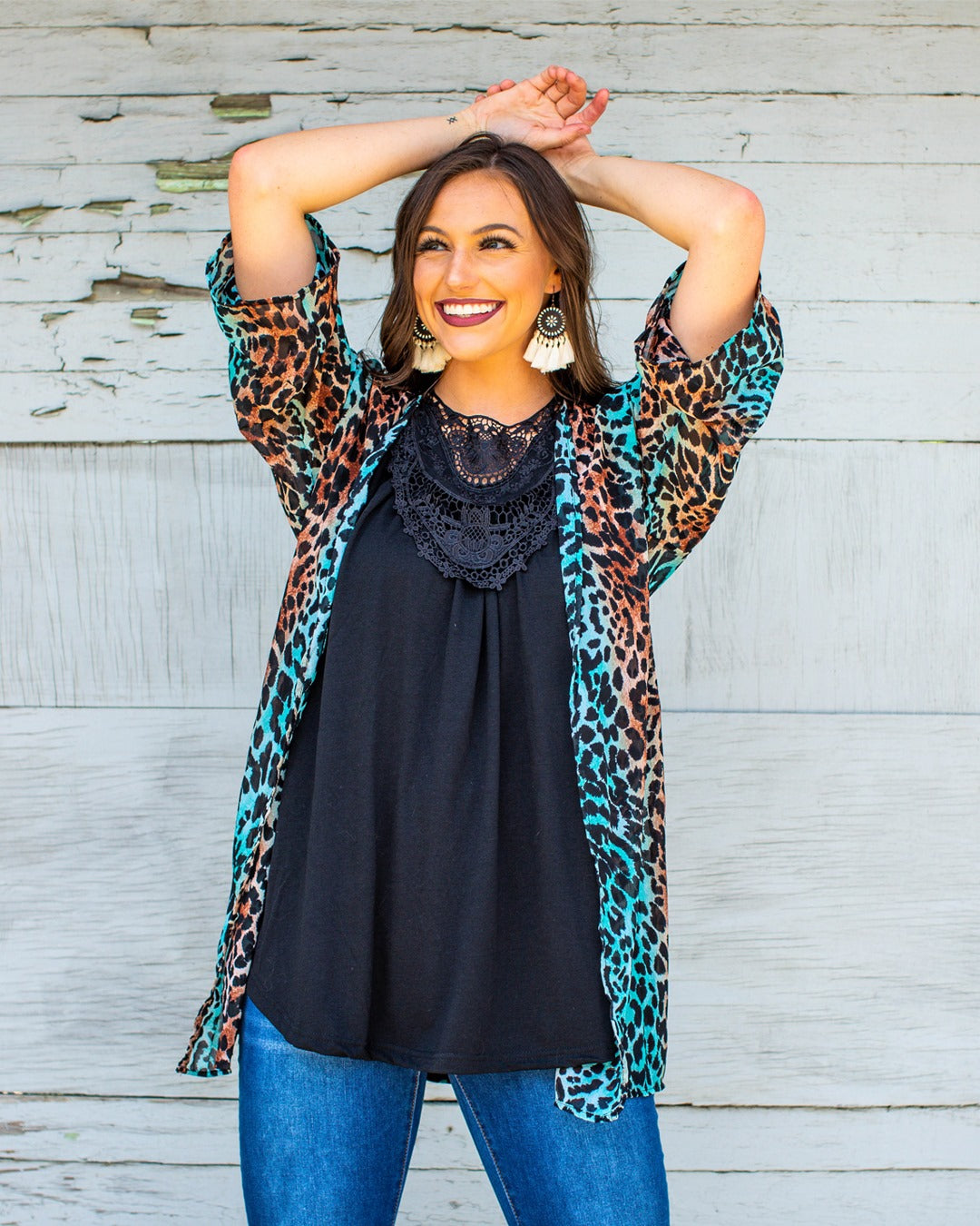 Inspired by the Urban Western and Boho styles, this Mia Black Sleeveless Top features delicate crochet details on the front. Add a touch of chic and bohemian flair to your wardrobe with this versatile and stylish top. Perfect for any cowgirl looking to elevate her fashion game!