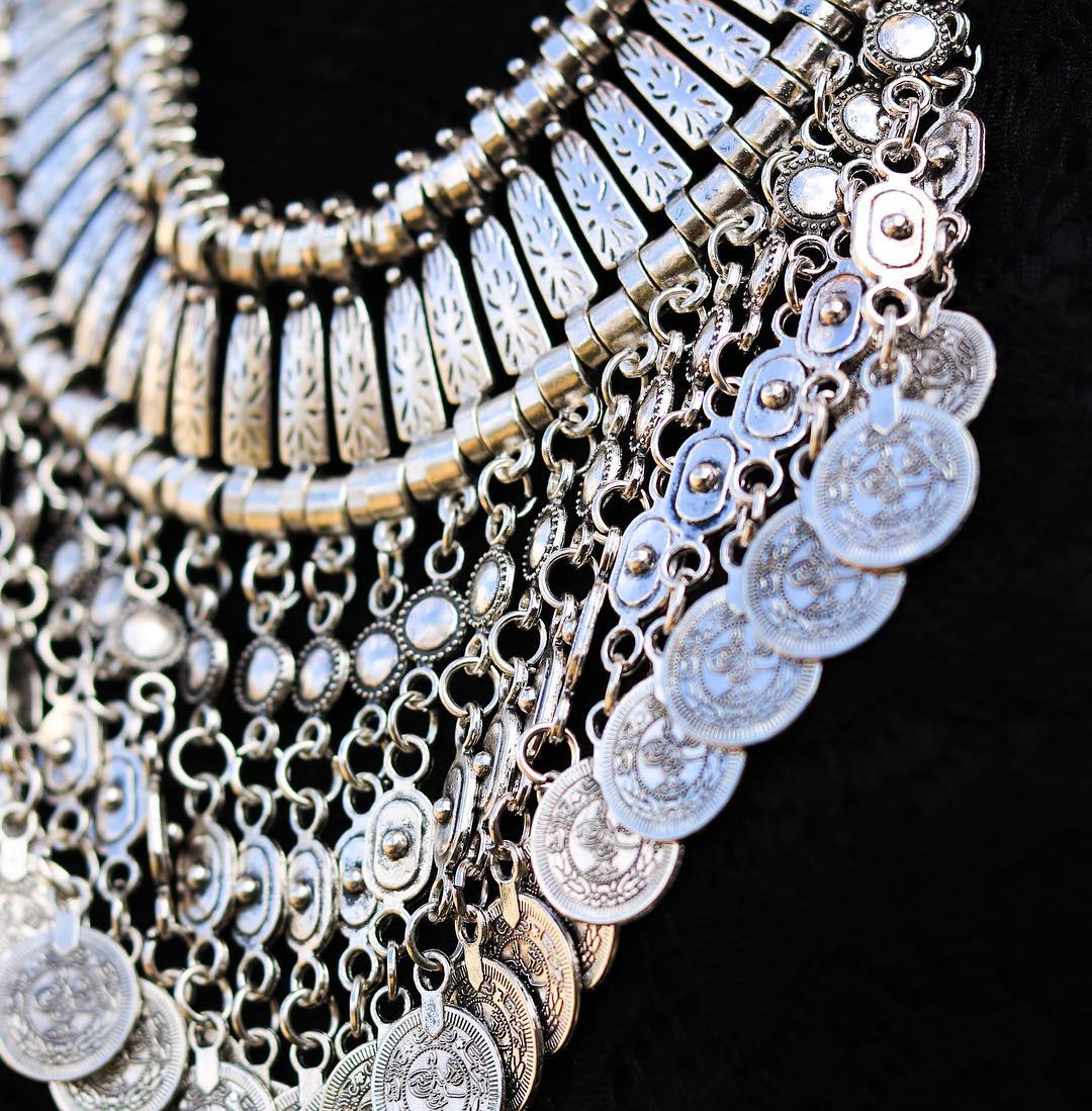 This Bohemian-inspired necklace adds a unique and stylish touch to any outfit. Its intricate design and vibrant colors make it a standout accessory. Handcrafted with care, this necklace is perfect for those who want to express their individuality and love for free-spirited fashion.