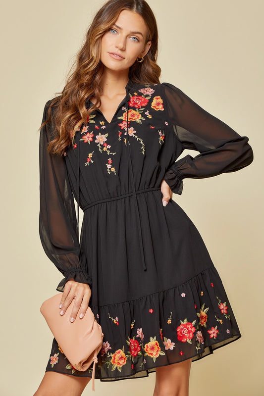 Indulge in the luxurious and exclusive style of the Embroidered Dress by Savanna Jane. This Boho-inspired dress combines chic and western fashion for a sophisticated and elegant ensemble. Made with high-quality denim, this dress is the perfect essential for any cowgirl or urban western fashion lover. Elevate your wardrobe with this bohemian and boho-chic style that exudes the essence of women's apparel.