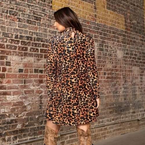 Introducing the Emily Leopard Printed Velvet Dress - the perfect blend of chic and boho style. Crafted with luxuriously soft velvet, this dress features a mock neck and convenient pockets, making it both fashionable and functional. With its bold leopard print, it's the perfect addition to your urban western wardrobe.