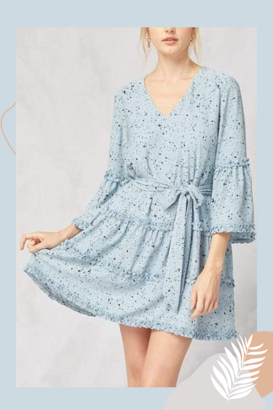 Elevate your style with our Frida Spotted V-neck Mini Dress. Featuring 3/4 sleeves with ruffle detail and a self-tie closure at the waist, this lightweight dress is the perfect combination of boho and chic. The lined woven fabric adds a touch of sophistication while the bohemian and cowgirl elements make it a versatile addition to any wardrobe.